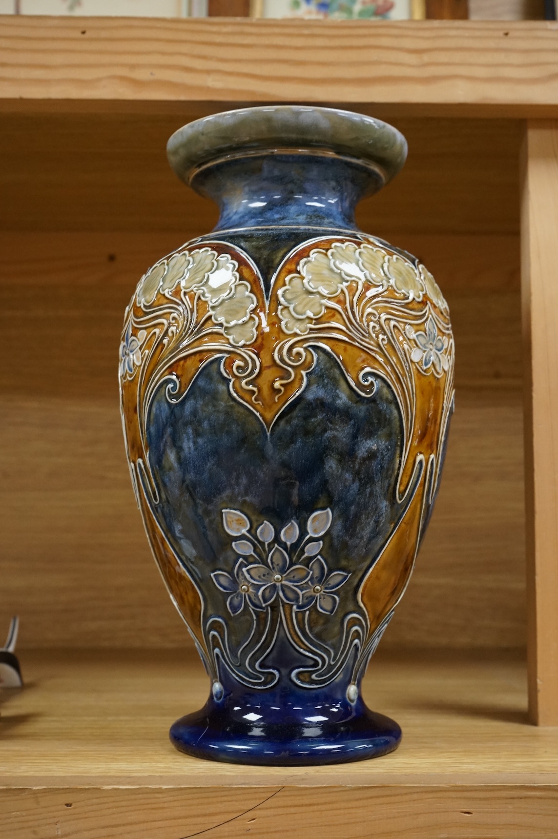 A Doulton Lambeth vase by Eliza Simmance, with repaired foot, 28cm high
